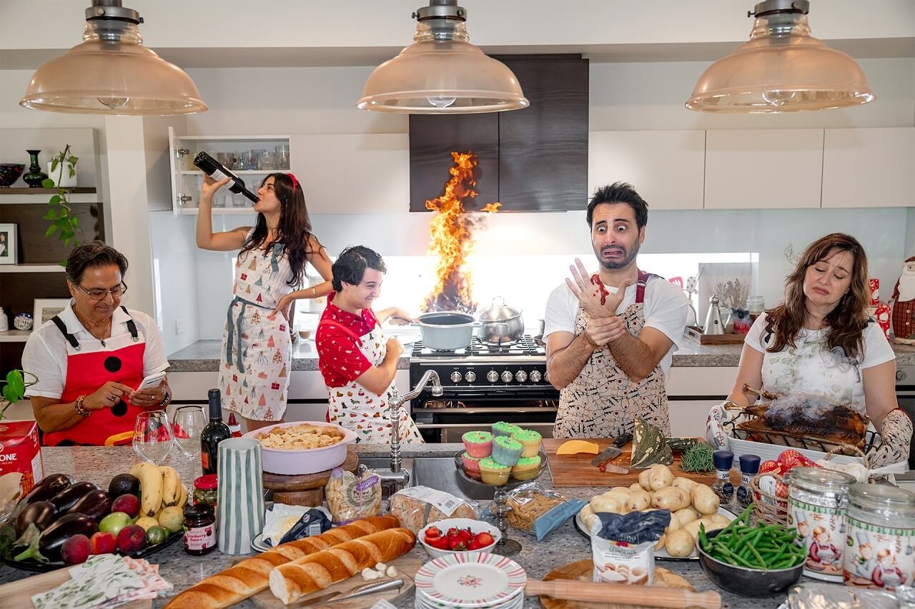 The five Adras fail to cook Christmas lunch in a chaotic, burning kitchen.